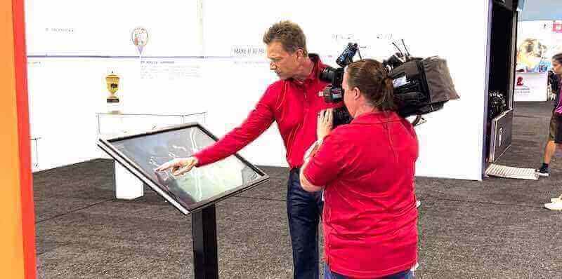 Professional filming interactive display demonstration Interactive display engagement