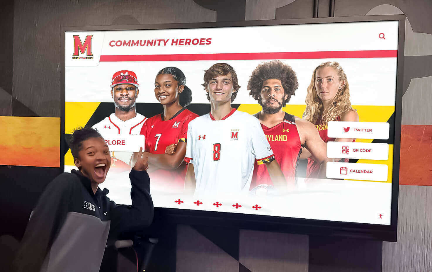 Students interacting with hallway display